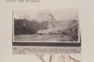 Looking north from mouth of Bridge Canyon on Colorado River.  Note top of Wingate sandstone; also cliff of McElmo at top