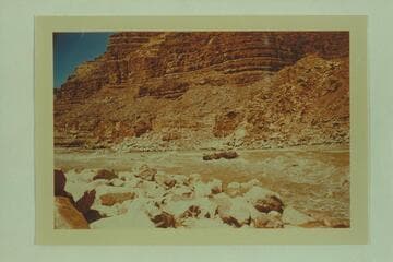 Pontoon No. 1 in Mile 24.5- Tanner Wash Rapid.  Clarke and Bruce Lium as boatmen