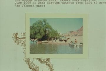 The Harris-Brennan party depart Lees Ferry as Dock Marston watches from left of center