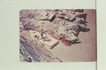 Susie Reilly in the "Galloway,"  2/3 of the way down Sockdologer Rapid.  Bright Angel gauge:  15,000 cfs