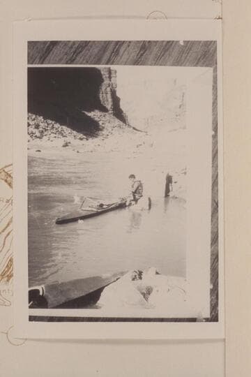 Les Jones replacing lock broken in 23 1/2 Mile Rapid.  The Gendarme is at upper margin