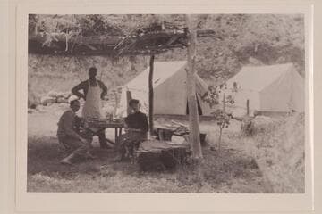 Dining at Rusts Camp on Bright Angel Creek.  Copy of print owned by Israel Chamberlain, Kanab, Utah