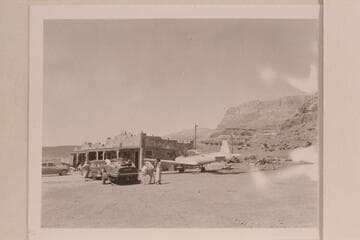 Various transport media to be found at Art Greene's.  Cliff Dwellers Lodge on the highway west of Marble Canyon Bridge.  The motor car is towing the motor boat which is about to make a traverse of the Grand Canyon