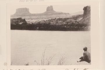 Buttes of the Cross.  Crescent Castle; across Townsite Bottom from Mile 29.7.  John Harvey Jacobs sits on the shore