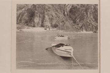 Garth in the stream at Bright Angel Creek.  Lucile Hiser sits on the bow with Moulty Fulmer in the cockpit