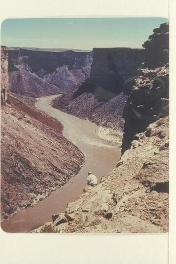 Soap Creek Rapid--Browns Riffle in the distance.  Chuck Richey takes a picture from under the Rim.  Preliminary Lees Ferry gauge:  87,600 cfs