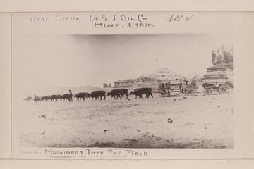 Charles Spencer's outfit hauling machinery into the oil field at Mexican Hat or to Copper Canyon