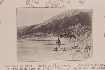 Dubendorff prepares lunch during stop between the mouth of Grand Wash and the head of Iceberg Canyon.  About Mile 285-286