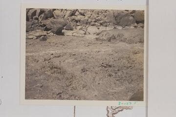 Skiff of the Dusty Dozen dropping into the hole near right bank of 85 Mile Rapid.  The boatman has been rowing bow first and facing the stern so is handicapped by turning to see what is ahead of him