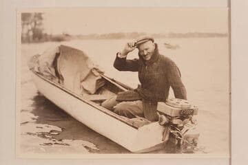 Lewis R. Freeman posing with an Elto motor.  Ohio River