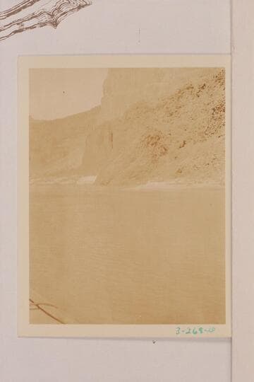 Lava flows at edge of river near Mile 187