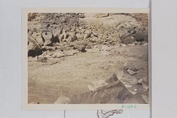 Skiff of the Dusty Dozen dropping into the hole near right bank of 85 Mile Rapid