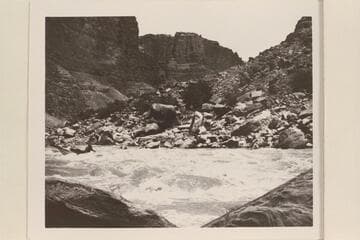 Norm Nevills in the "Wen" dropping into the head of Rapid No. 24 [24 crossed out].  Cataract Canyon in The Big Drop