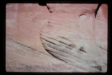 Peg holes for phone line below Camp Stone