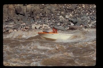 "Wee Red" climbing Dubendorff Rapids