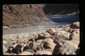 "Wee Red" climbing Dubendorff Rapids