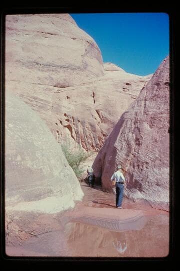 Pass west of Nasja Creek; Slim rides through