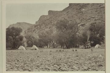 Hole-In-Wall camp, Jack Creek, Mile 69.85.  The hole in the wall can be seen upper left