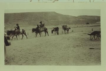 Navajo Indians on the move.  Between Grand Canyon and the Navajo Bridge at the time of the Bridge dedication in June, 1909 [should be 1929?]  Freeman photo