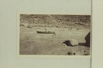 The "Boulder" running out the lower end of Soap Creek Rapid after being portaged.  Lees Ferry gauge:  22,700 cfs