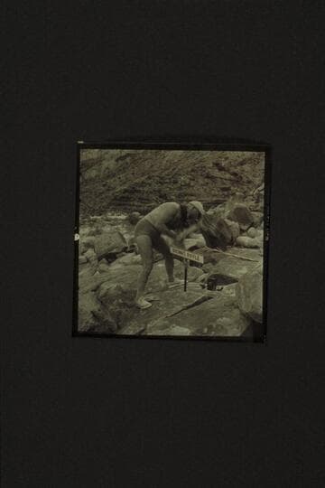 Marston pounding in the sign at Brown's Riffle.  Mile 12, Marble Canyon