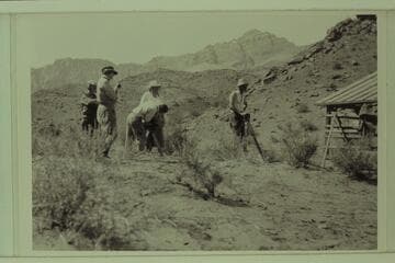 Photographers record the preparation of the USGS boats at Lees Ferry
