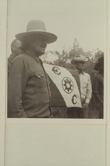 The official stamp of an exploration.  Middle fork of 73.6.  Buck Whitehat and Tom Daly hold the flag