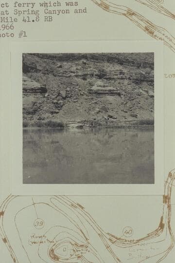 The derelict ferry which was operating at Spring Canyon and landed at Mile 41.8 right bank