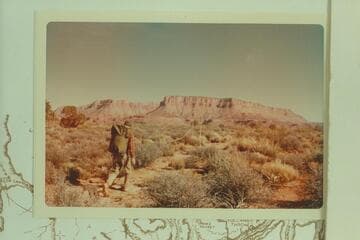 Doctor Tommy Mountain.  Harvey Butchart on the trail from Indian Canyon to the rim