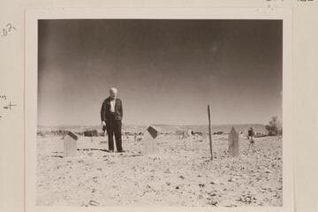 Graves of Galloway and his wife at Vernal cemetery.  Marston stands at grave