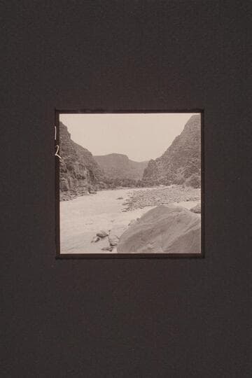 The boulder Island in the middle of Disaster Rapid, Canyon of Ladore, Mile 237