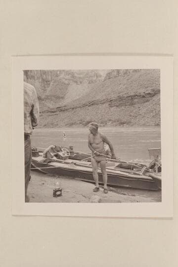 Rod Sanderson mooring the "Bootoo" at camp near Mile 210