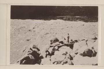 "Boulder" and "Glen" after portage of Lava Cliff Rapids.  Felix Koms (cook) on boat