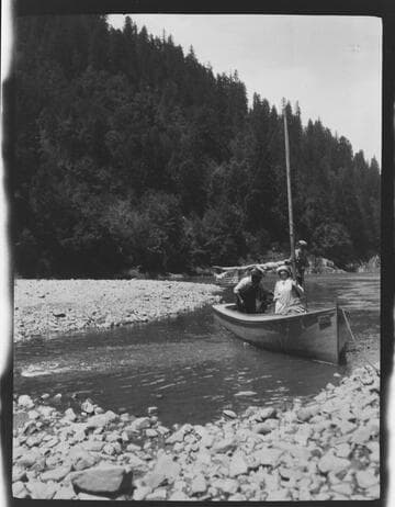 Pete Williams and Grace Nicholson in boat