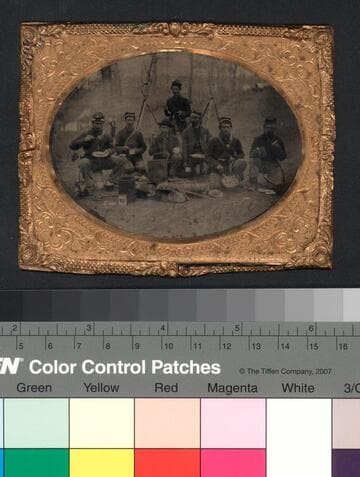 Lemuel Hazzard and six other Union soldiers having a meal