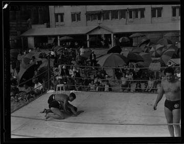 Wrestling match on beach, Santa Monica Athletic Club