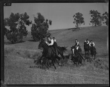 Santa Monica Lancerettes riding in a field