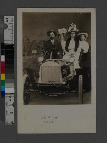 Portrait of a man and three women in a car, Venice, California