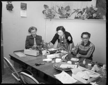 Women makeing floral centerpieces