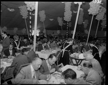 Tour group eating lunch in the tent