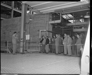 Tour group at Etiwanda Station in boiler racks