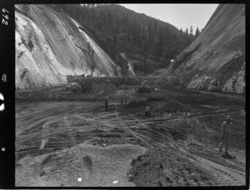 Big Creek - Mammoth Pool - Embankment placement in cutoff trench looking downstream