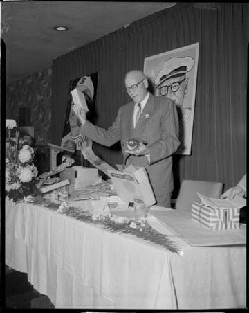 McFadden opening gifts at retirement party