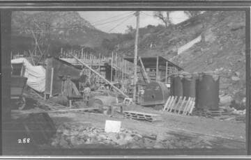 The power house yard at Kaweah #3 Hydro Plant with construction equipment and materials