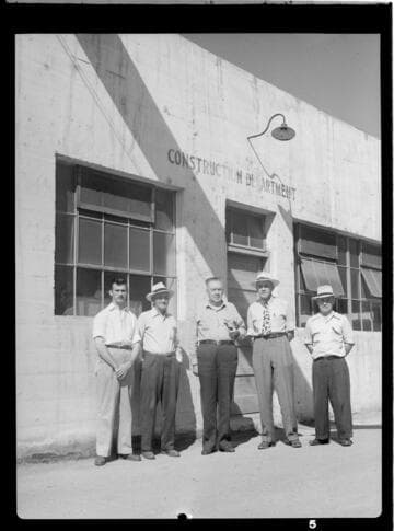 Group of employees standing outside Construction Department