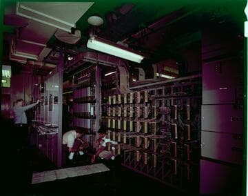 SCE Telecommunications crew working on panels at Long Beach Building