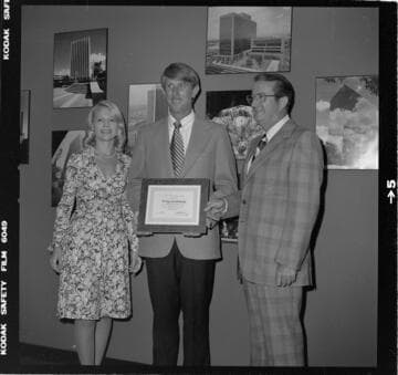 Conservation award presented to Tooley & Company