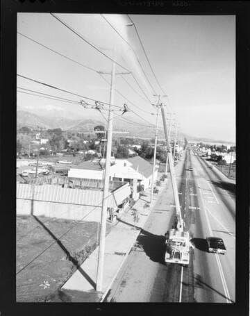 Linemen working on 66kV transmission line