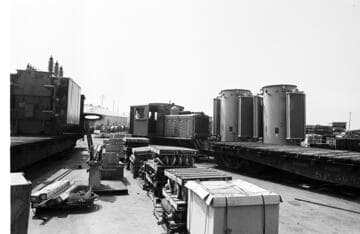 Moving large transformers and other electric equipment on railroad flatcars into an Edison facility using a diesel-electric switch engine
