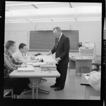 Men in training for work in a control center